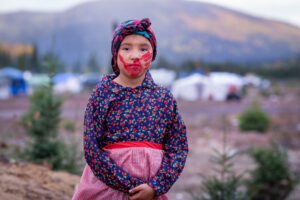 Chloe Benuen of the Innu First Nation in traditional costume after a ceremony at the annual Innu First Nations clan gathering at Gull Island, Labrador on the eve of Canadas Day of Truth and Reconciliation, which is meant to honour the lost children and survivors of residential schools. Photo by Greg Locke