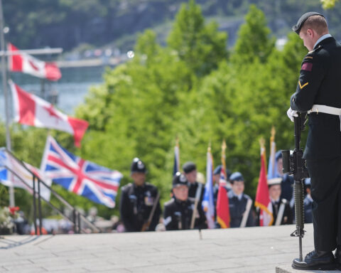 A Royal Newfoundland Regiment soldier stands at the National War Memorial in St John's, Newfoundland on Memorial Day. July 1, 2026. Comemorating the World War 1 Battle of Beaumont Hamel in France. Photo by Greg Locke